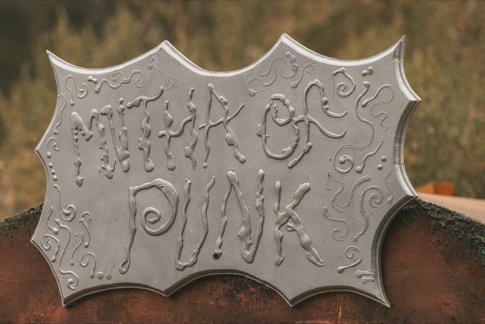 Hand-carved Mutha of Punk signage detail